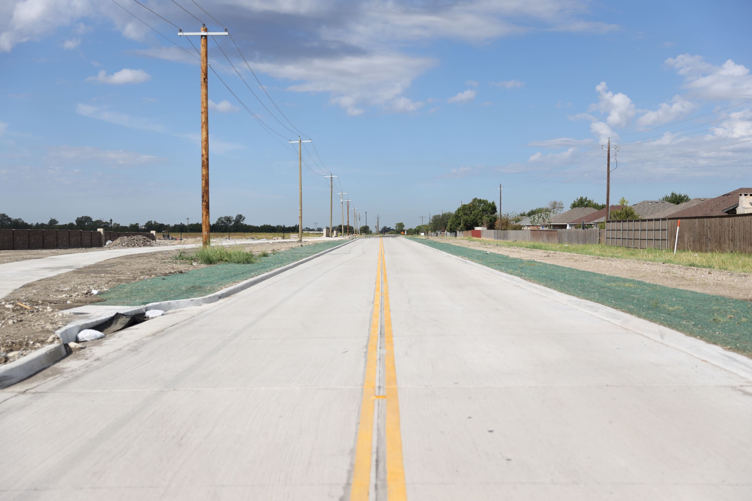 Lindsey Lane Road improvement, new roadway with sidewalks and street lighting
